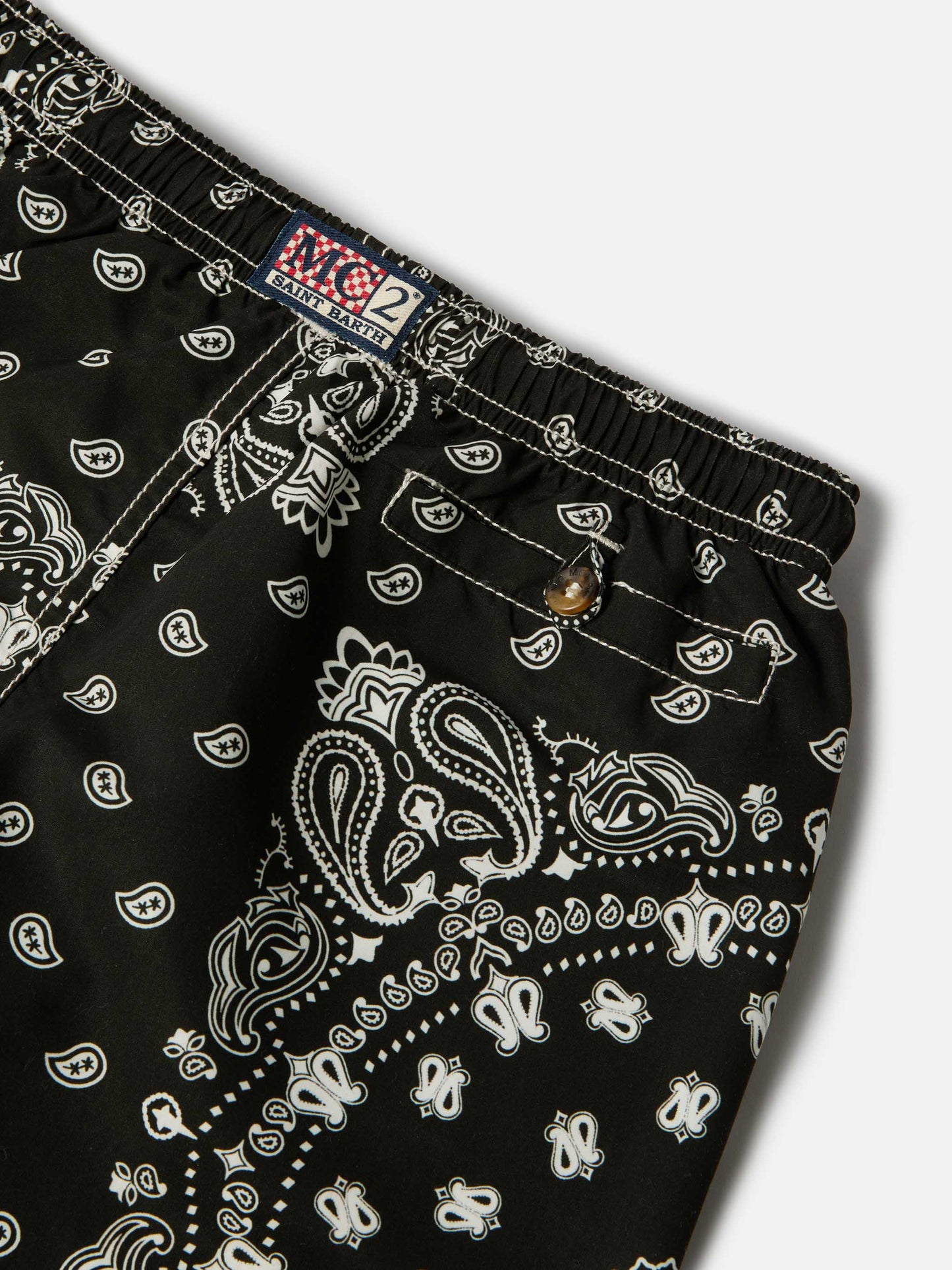 Caprese Jr swim shorts with black bandana print