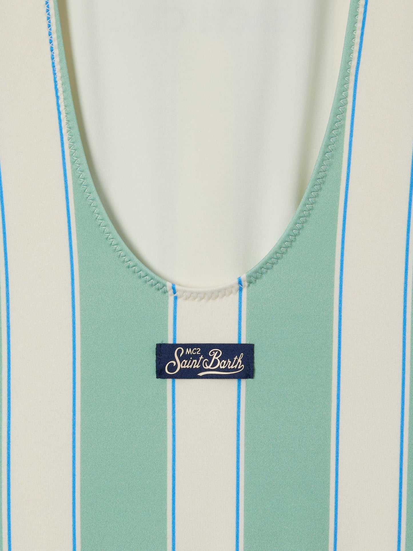 Cara green and white striped one-piece swimsuit with Beach Club print