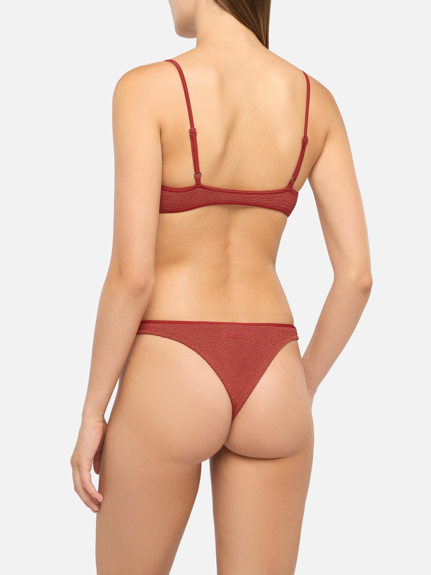 Bralette bikini Judy Naomi with cheeky swim briefs in rust orange crinkle