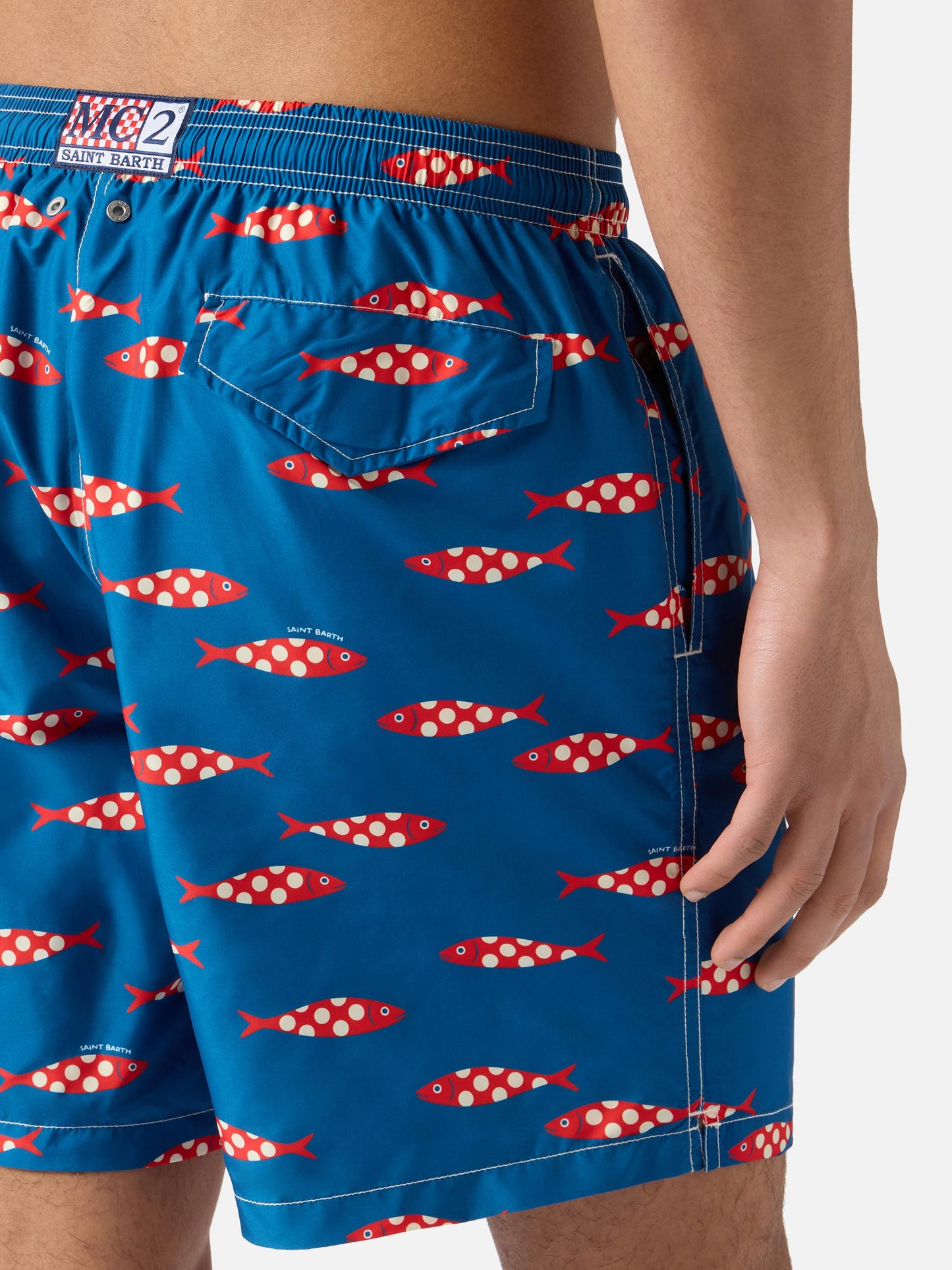 Blue Lighting swim shorts with all-over sardines print