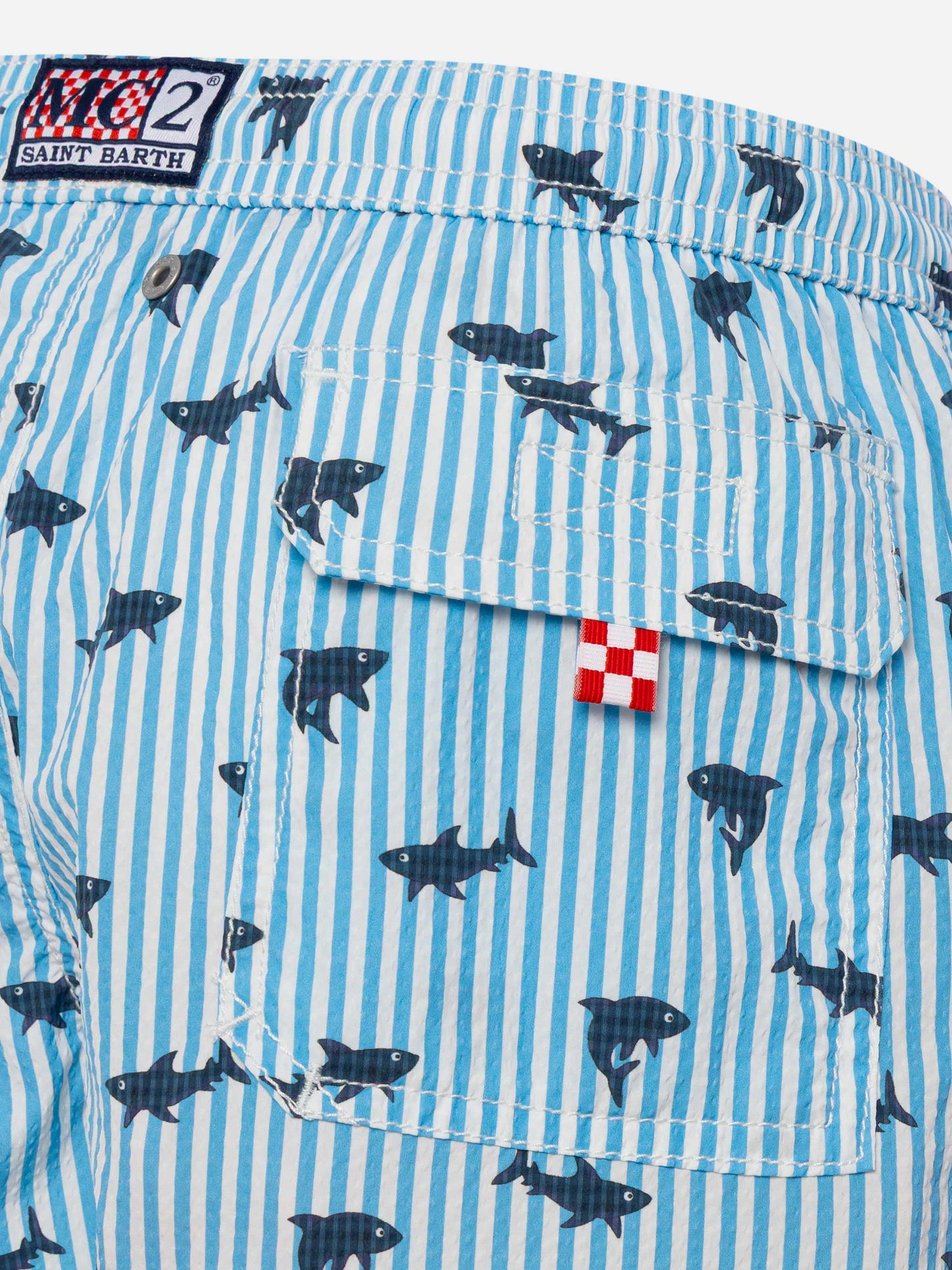 Costume mare Patmos Jr media lunghezza in seersucker rigato con stampa squalo