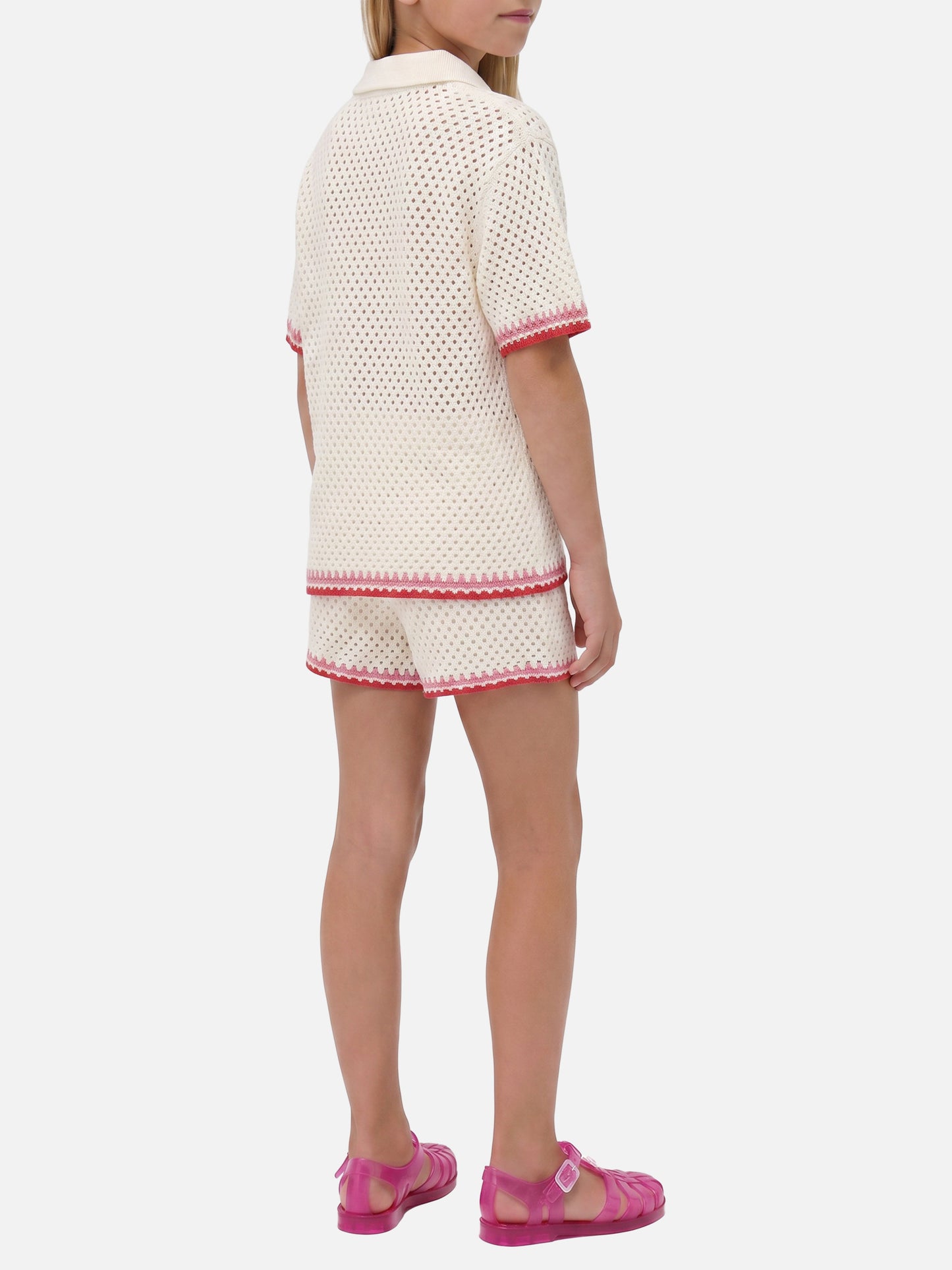 Polo Pixie Jr en mezcla de algodón blanco con parches bordados
