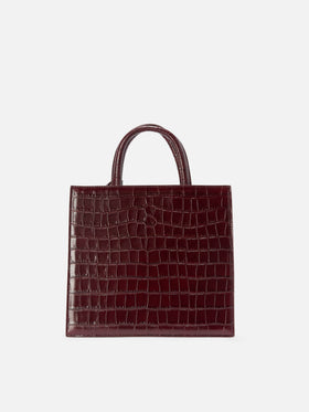 Shop Bag Midi Handbag in burgundy crocodile-print leather