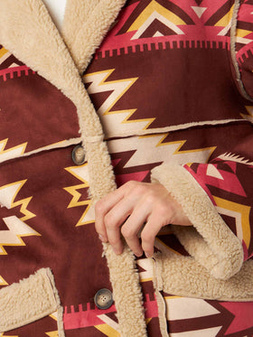 Beiger wendbarer Dorys-Mantel aus Shearling mit Ethno-Muster 