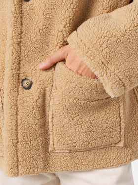 Beiger wendbarer Dorys-Mantel aus Shearling mit Ethno-Muster 