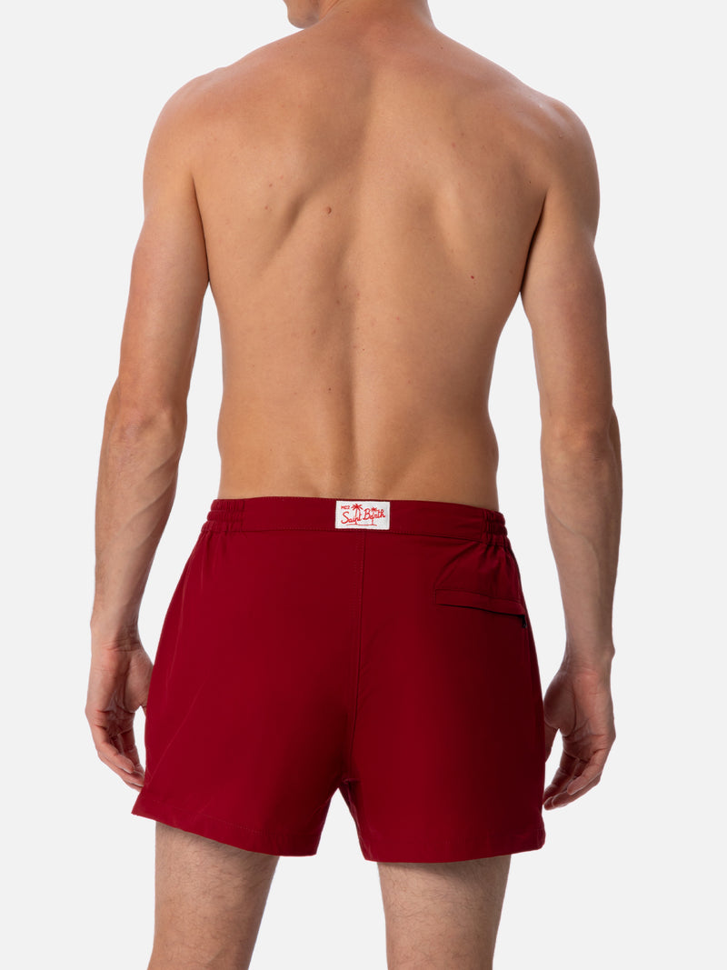 Man burgundy fitted cut swim shorts Harrys