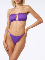 Woman purple bandeau bikini