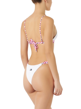 Woman triangle bikini with geometric pattern
