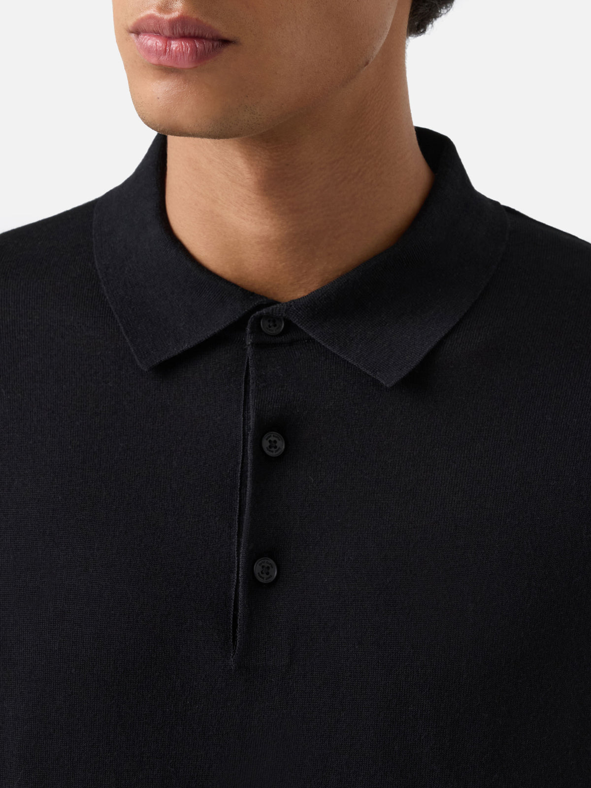 Polo Alfie aus schwarzer Merinowolle 