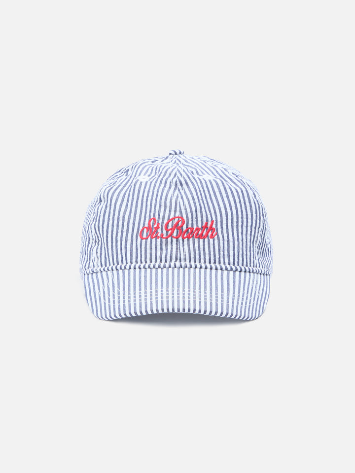 Baseball cap with visor in cotton seersucker with blue and white stripes