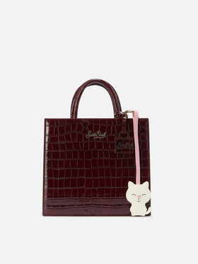 Bag charm a forma di gatto in pelle liscia con targhetta logo