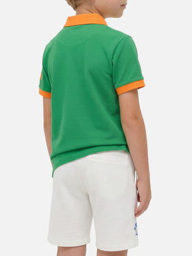 Polo da bambino in piquet verde con logo St. Barth arancione