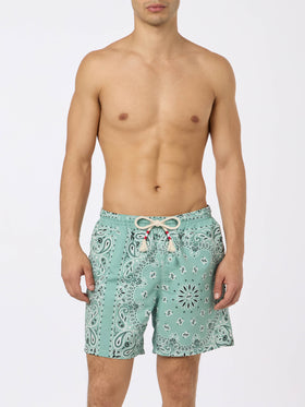 Mid-length swim-shorts Caprese with sage green bandanna print