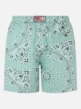 Mid-length swim-shorts Caprese with sage green bandanna print