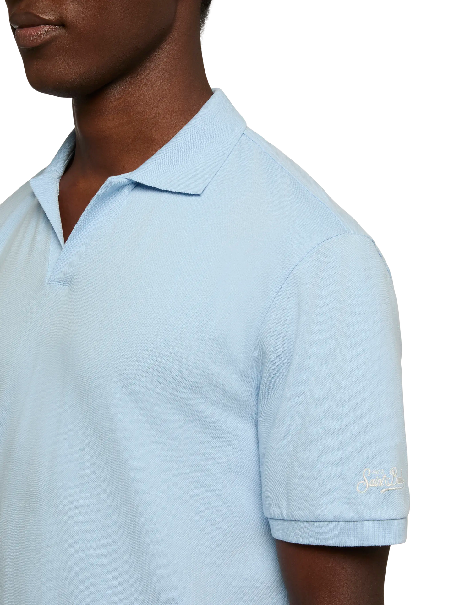 Polo Charles in piquet di cotone azzurro senza bottoni