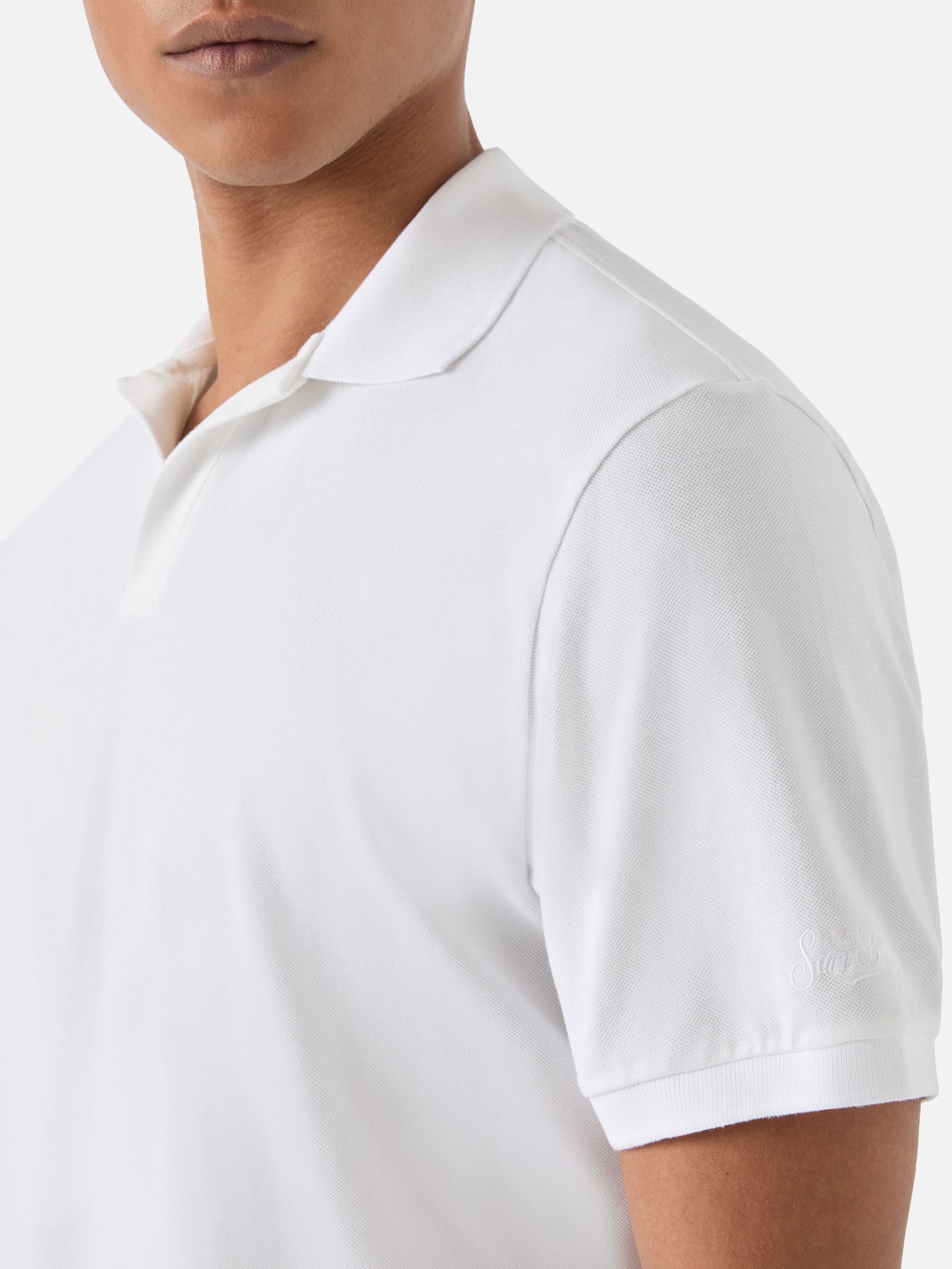 White Charles polo in solid color cotton piquet