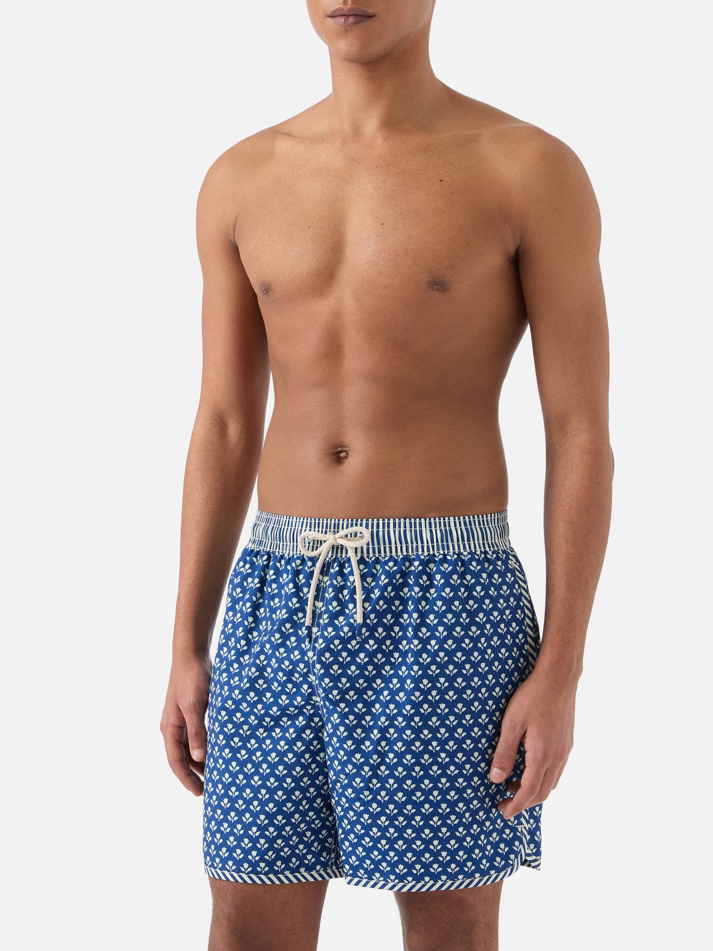 Comporta swim shorts with batik floral print