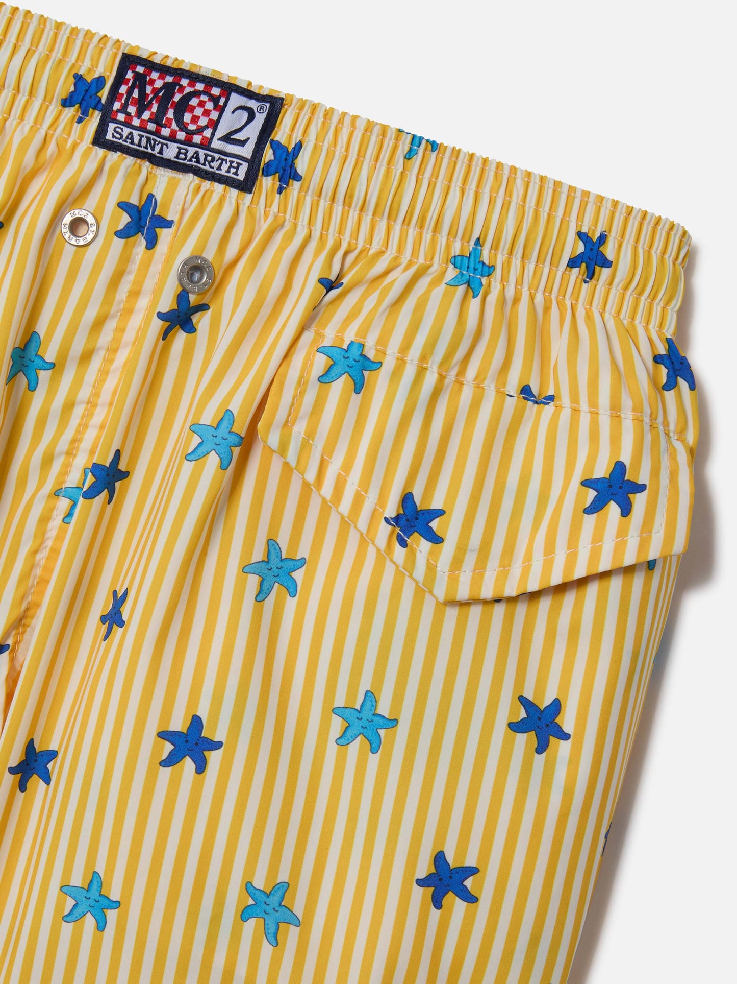 Boy Comfort Light Jr swim shorts with starfishes print