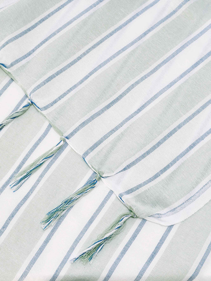 Foutas Lightbeach towel with aqua green and white stripes and embroidered logo