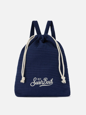 Blue beach towel with integrated bag