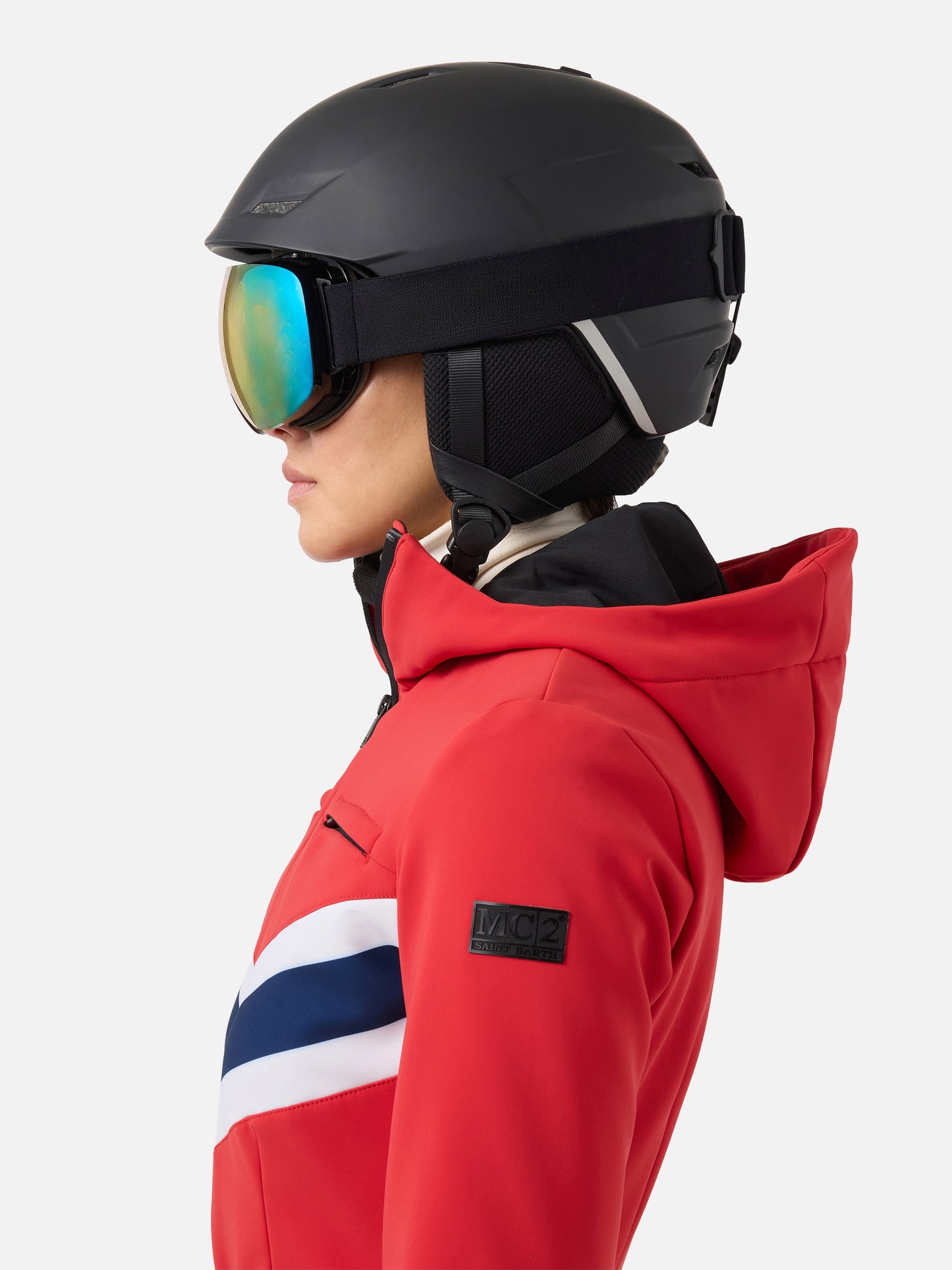 Woman red ski suit Garmisch with RECCO® technology