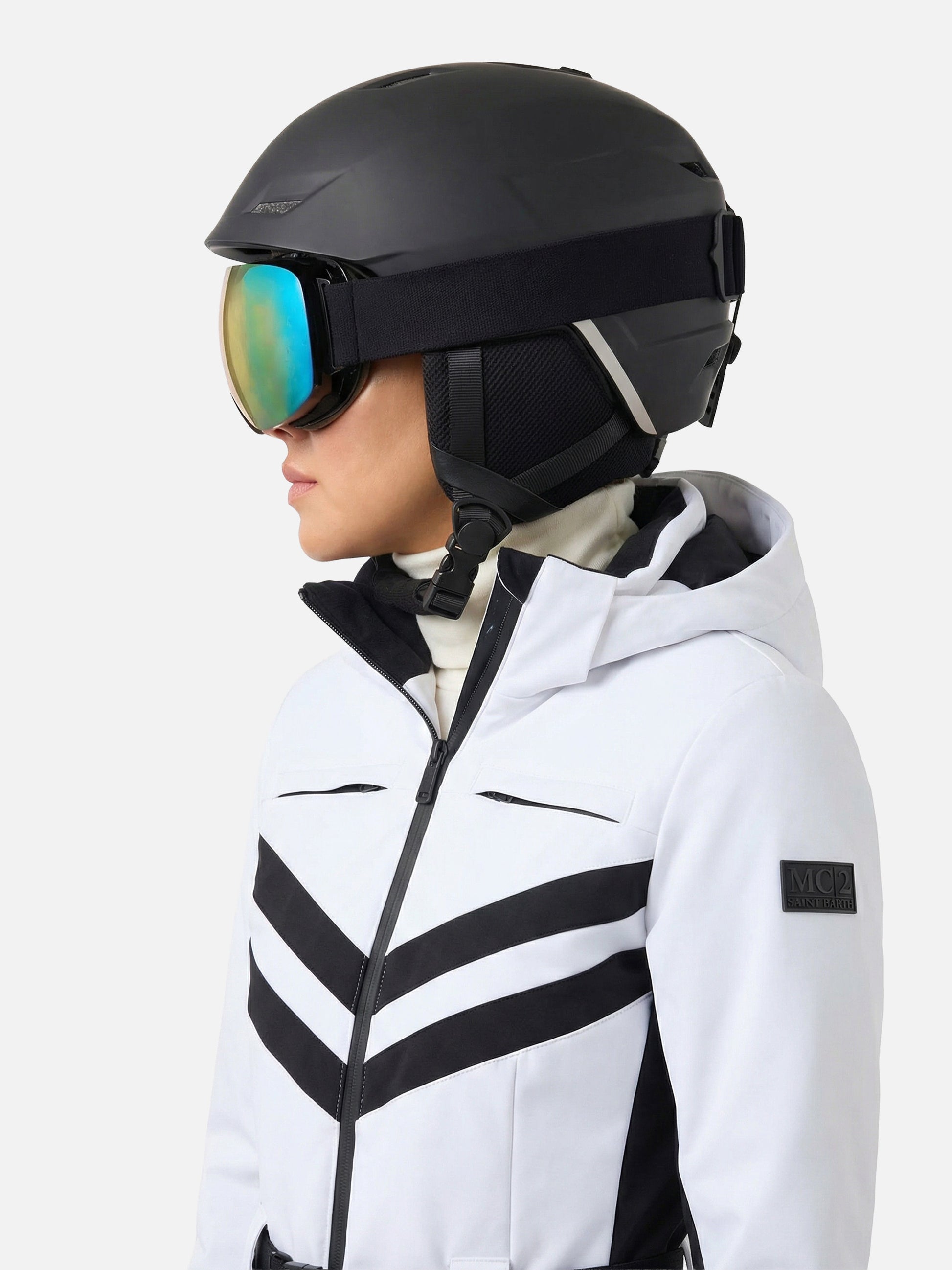 Woman White ski suit Garmisch with RECCO technology