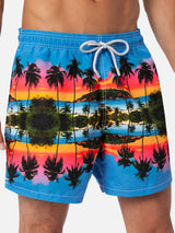 Man mid-length Gustavia swim-shorts with palms landscape placed print  |  AI CO-CREATED DESIGN BY RICKDICK - POWERED BY RED-EYE