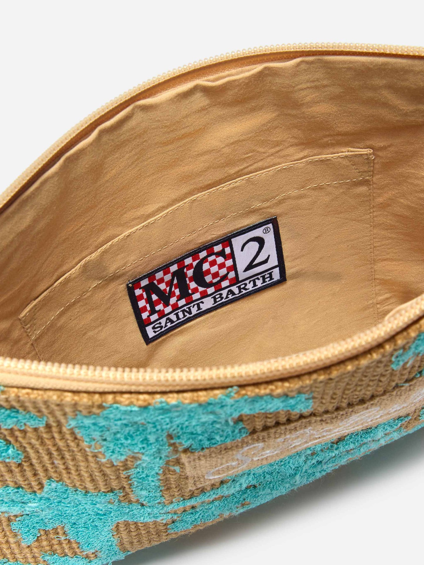 Jute pouch with embroidered palm pattern