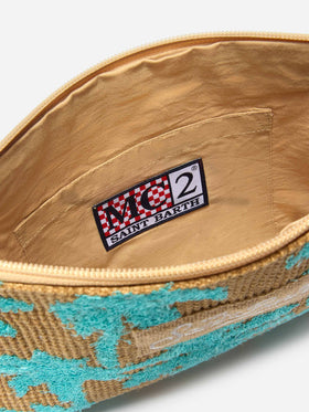 Jute pouch with embroidered palm pattern