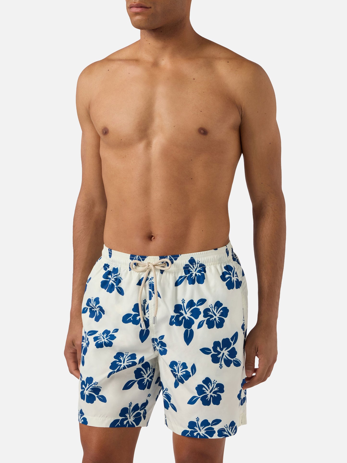 White Lighting swim shorts with all-over hibiscus print