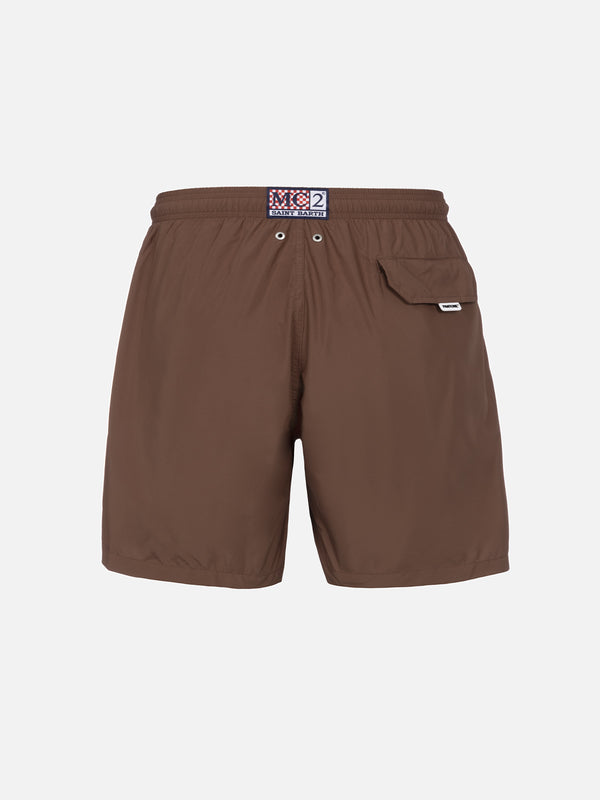 Man lightweight fabric brown swim shorts Lighting Pantone | PANTONE® SPECIAL EDITION