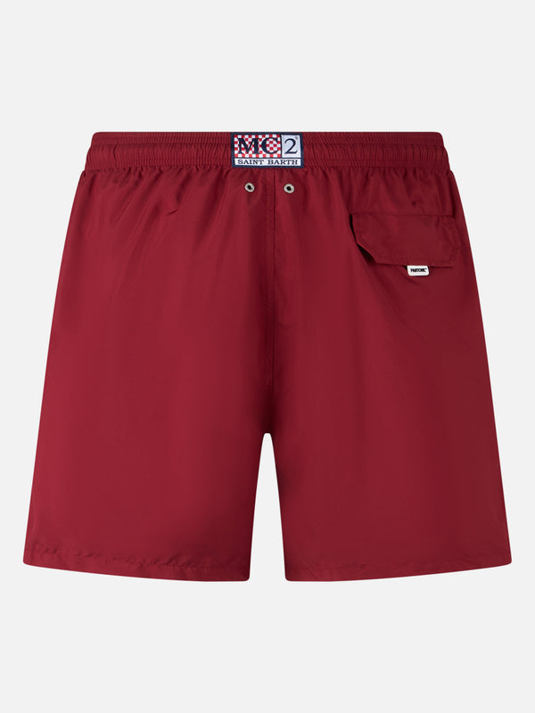 Man lightweight fabric burgundy swim shorts Lighting Pantone | PANTONE® SPECIAL EDITION