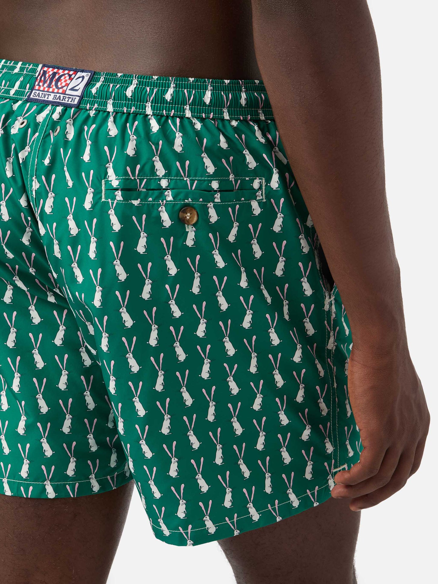 Lighting swim shorts in technical fabric with rabbit pattern in green and multicolor