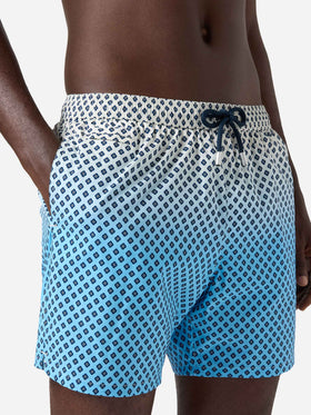 Lighting Micro swim shorts with geometric print on shaded background