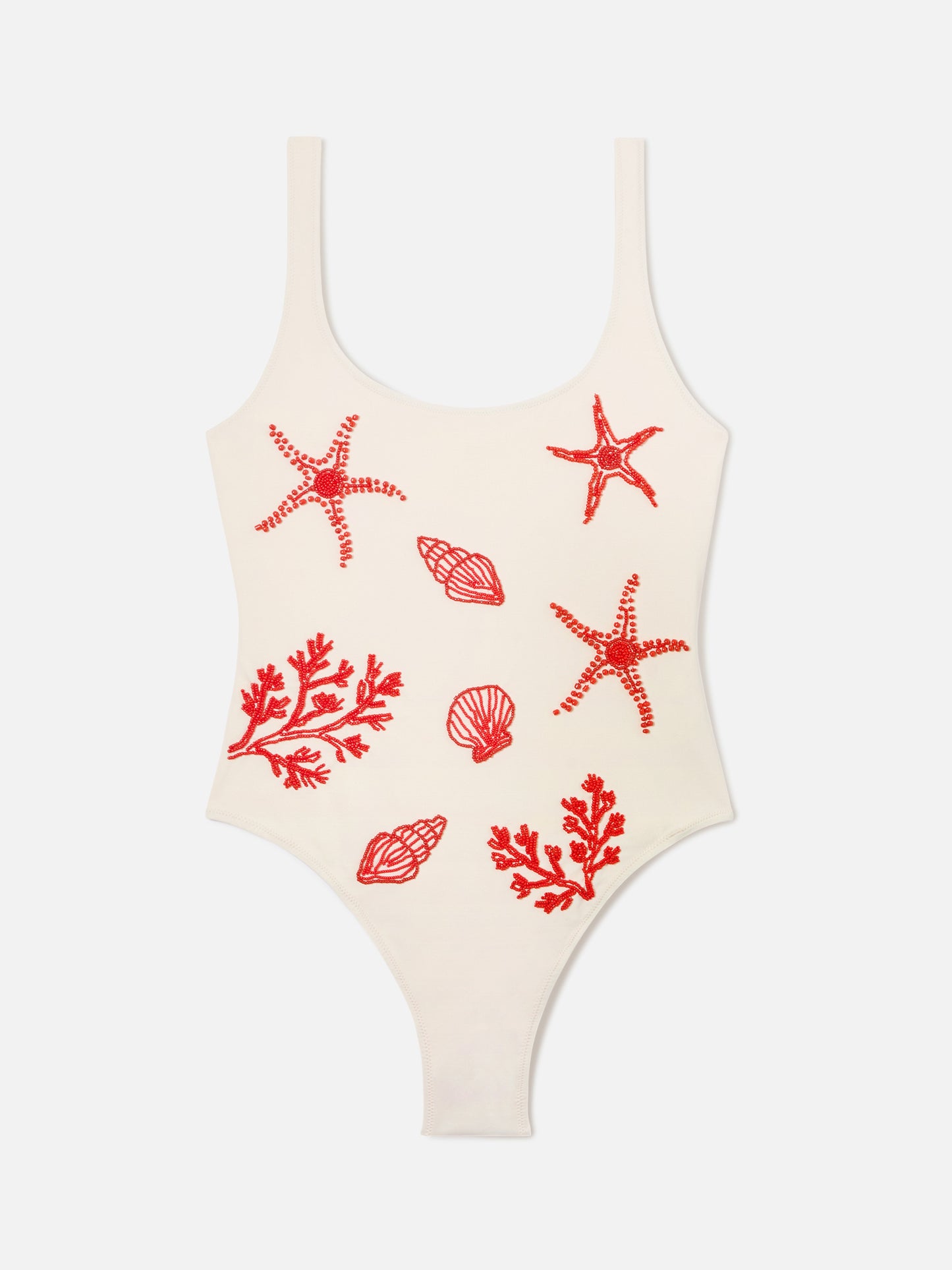 Bañador de una pieza Lora en color crema con decoraciones de cuentas de temática marina 