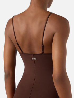 Medea one-piece swimsuit in brown with beaded sea-themed decorations