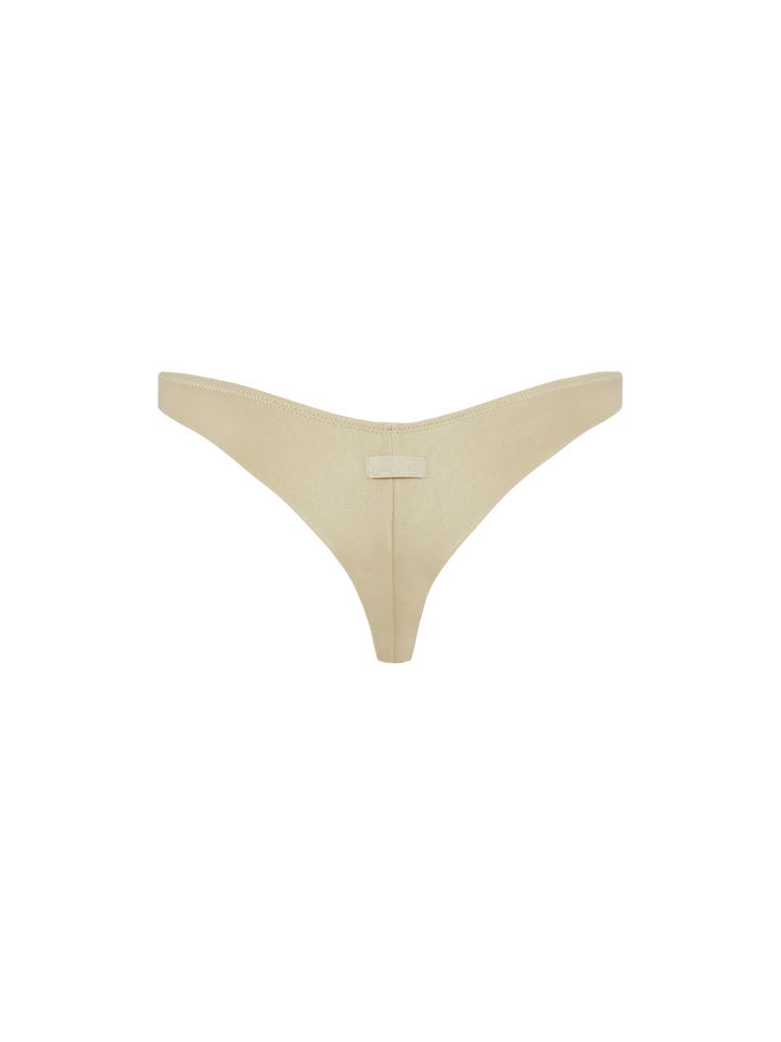 Naomi – Goldfarbene, freche Badehose mit großer Strassverzierung