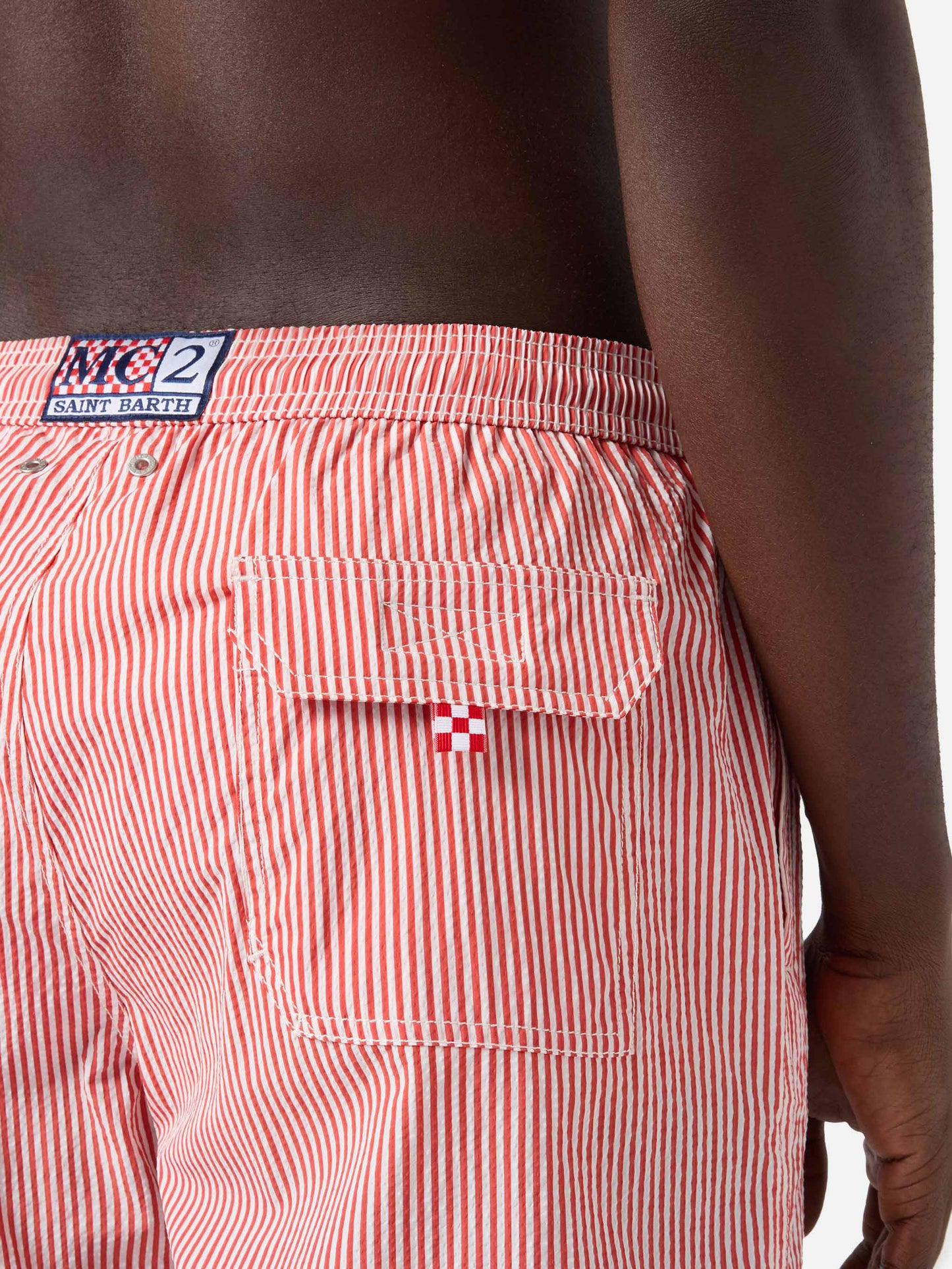 Patmos seersucker striped swim shorts in red and white
