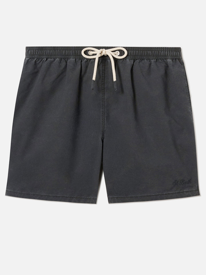 Patmos swim shorts in black with used effect and logo embroidery