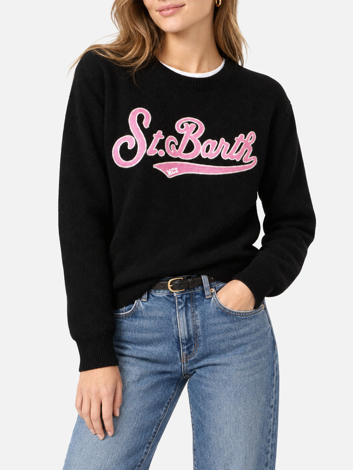 Black New Queen sweater with terry logo