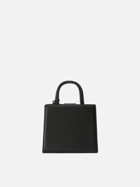 Structured Shop mini bag in black smooth leather with metal tag