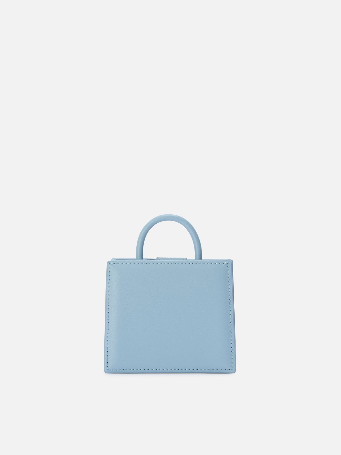 Structured Shop micro bag in light blue smooth leather with metal tag