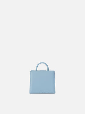 Structured Shop micro bag in light blue smooth leather with metal tag