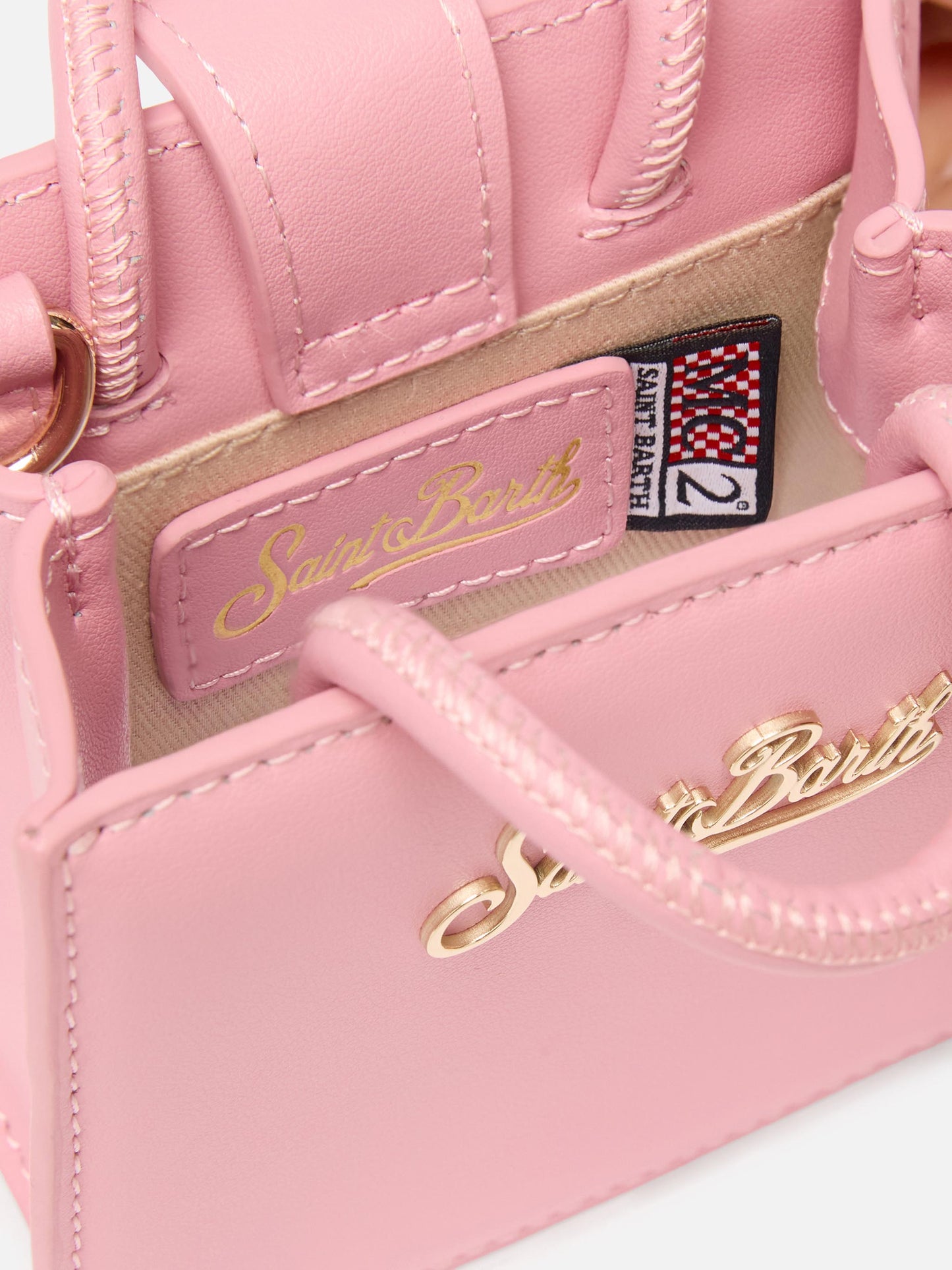 Structured Shop micro bag in pink smooth leather with metal tag