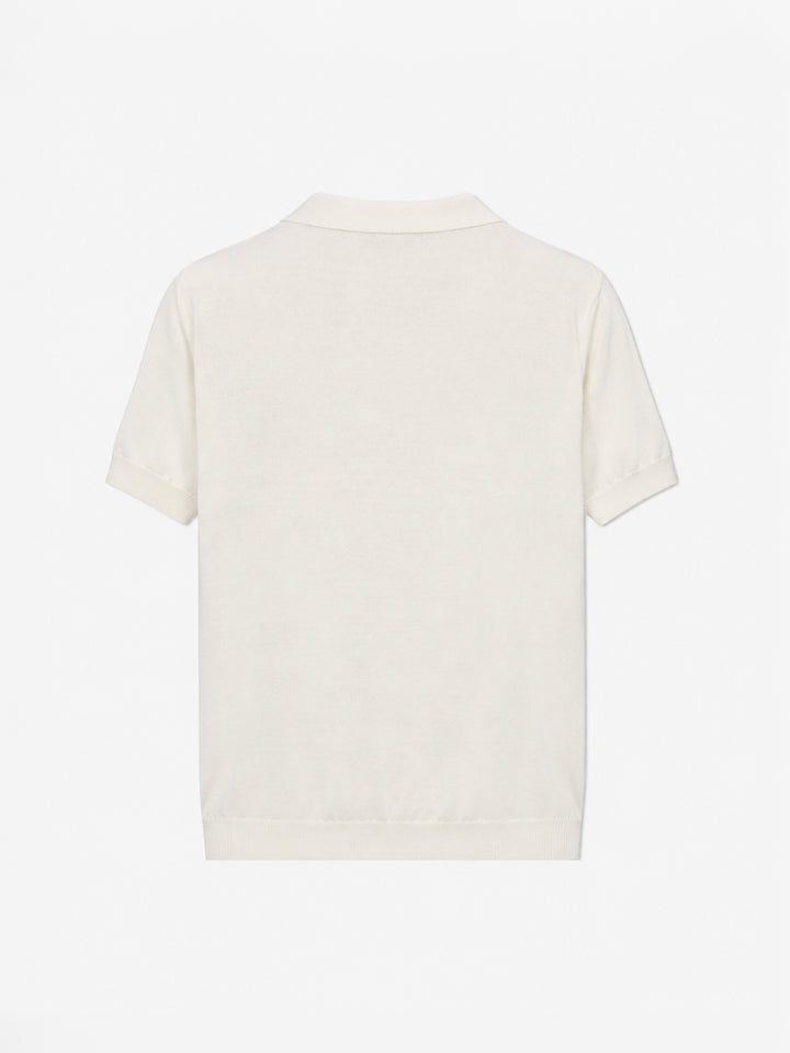 Polo Sloan Jr in maglia bianca