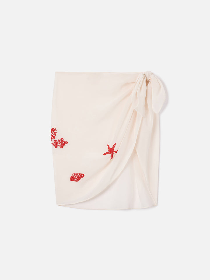 Sery short pareo in cream with beaded sea-themed decorations