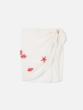 Sery short pareo in cream with beaded sea-themed decorations