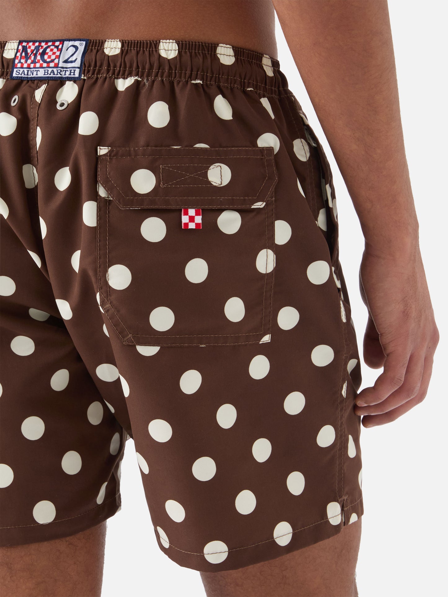 Syros swim shorts in brown with polka dot embroidery