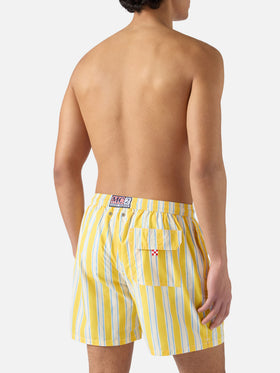 Syros swim shorts with yellow striped pattern and logo embroidery
