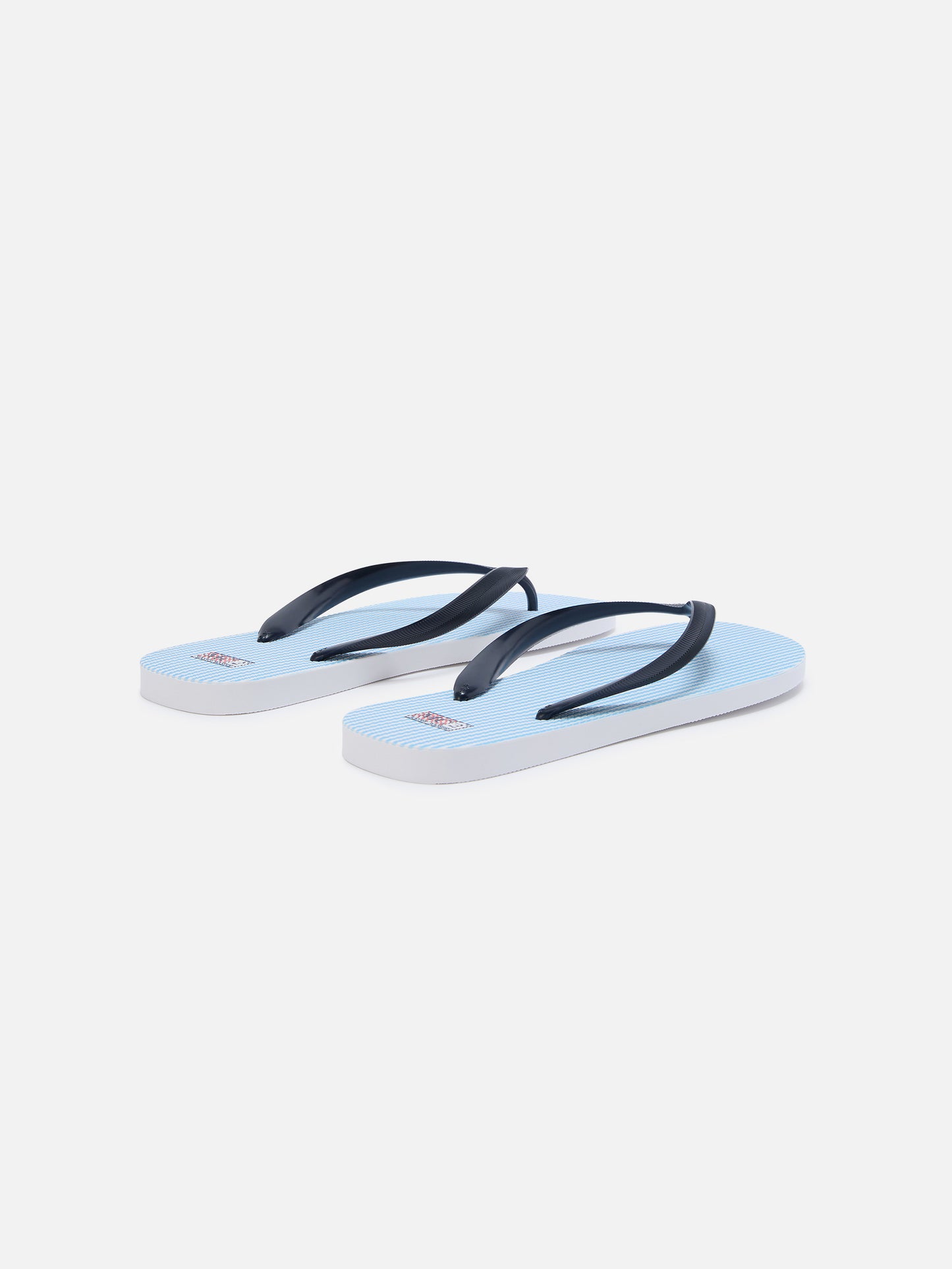 Chanclas slip-on de goma Tommy con rayas azul claro 